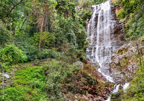 Fototapeta Beautiful waterfall in Batu Caves sacral place in Kuala Lumpur, Southeast Asia. Malaysia.