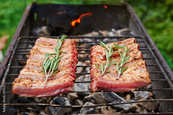 Fototapeta raw pork's ribs on grill