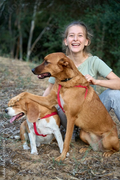 Fototapeta A gorgeous lady with her lovely dog
