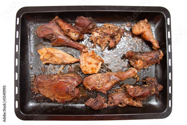 Fototapeta roasted chicken on a baking sheet on a white background