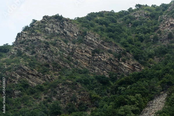 Fototapeta Rhodopes, are a mountain range in Southeastern Europe. Bulgaria. Tectonic dislocations are a violation of the occurrence of rocks under the influence of tectonic processes.