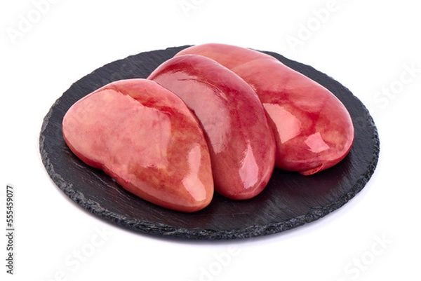 Fototapeta Raw pork kidneys, offals, isolated on white background. High resolution image.