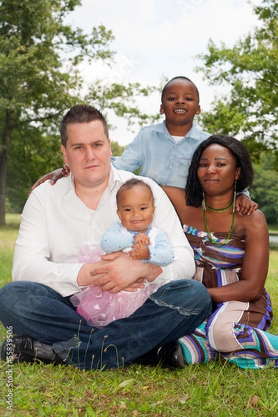 Fototapeta Mixed family in the park