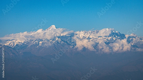 Fototapeta Panoramic beautiful view of mount Trisul, Nanda Devi with the beautiful sky on the way to Binsar, Kasardevi, Almora Uttarakhand 