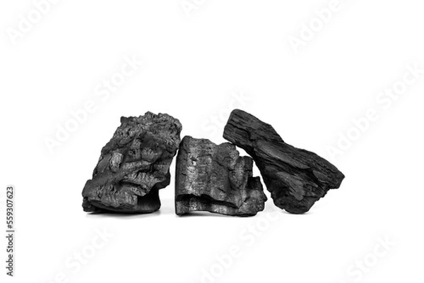 Fototapeta Close up pile of coals or black charcoal stack isolate on white background