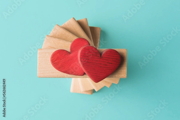 Obraz Two Valentines hearts on wooden blocks. Valentine’s day greeting