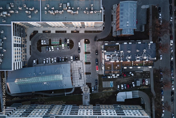 Fototapeta Car parked near residential building, top view