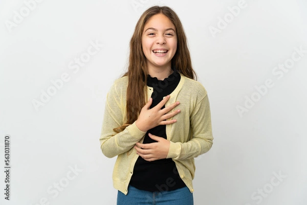 Fototapeta Little girl over isolated white background smiling a lot