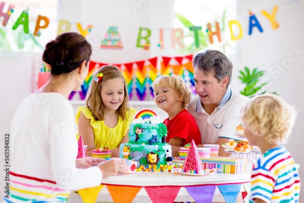 Fototapeta Child birthday party cake. Family with kids.