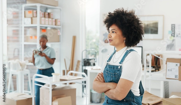 Fototapeta Motivation, goal and business woman looking happy and proud in a startup company office. Leader, vision and small business owner enjoying her career success at new workspace, empowered and powerful