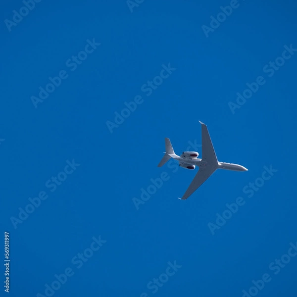 Obraz Flugzeug am blauen Himmel