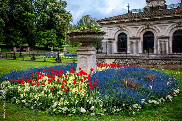 Fototapeta Beautiful small house in the center of Hyde park with a pond and fountains and a flower garden in London, England