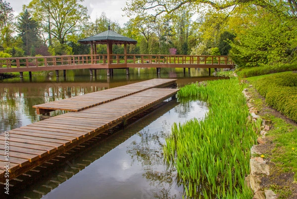 Obraz Wooden pier and wooden bridge and gazebo in centre in Japanese garden in Wroclaw