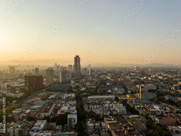 Fototapeta Beautiful aerial view of the capital of Mexico city of Mexico City at sunset.