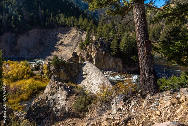 Fototapeta Sunbeam dam remains in Yankee Fork of the Jordan Creek in Idaho in sunny autumn day