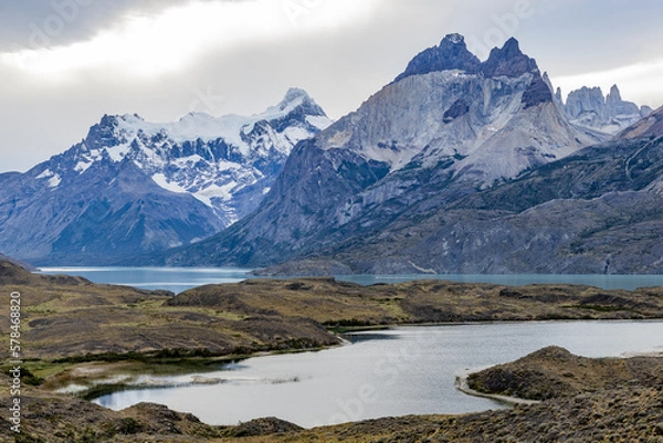 Fototapeta Impressive mountains and a lake with turquoise water at Torres del Paine National Park in Chile, Patagonia, South America