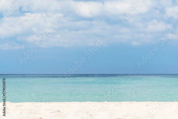 Fototapeta Bright sand beach, sea and beautiful sky with clouds