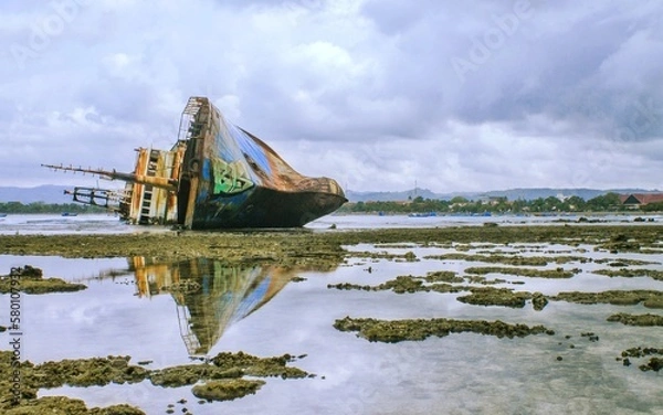 Fototapeta Shipwreck on pangandaran beach, indonesia