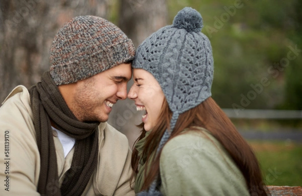 Fototapeta Nature lovers. A happy young couple spending time together outdoors.