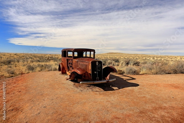 Fototapeta Route 66 abandoned car situated near the entrance of Petrified Forest National Park in Arizona, USA