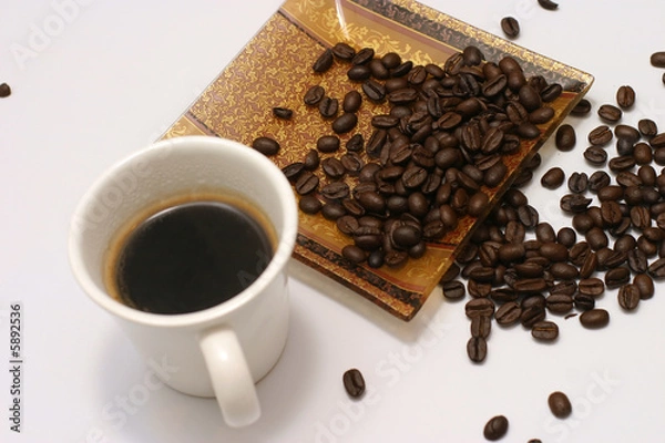 Fototapeta coffee seeds with cup