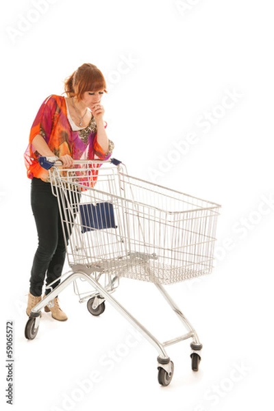 Fototapeta Woman with empty shopping cart