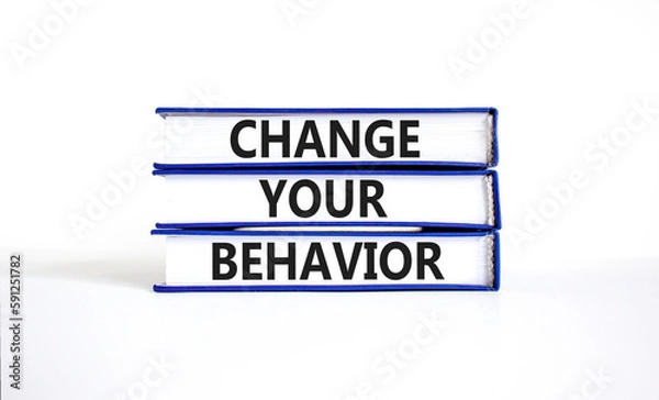 Fototapeta Motivation and Change your behavior symbol. Concept words Change your behavior on books on a beautiful white table white background. Business change your behavior concept. Copy space.