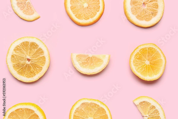 Fototapeta Composition with slices of fresh lemon on pink background