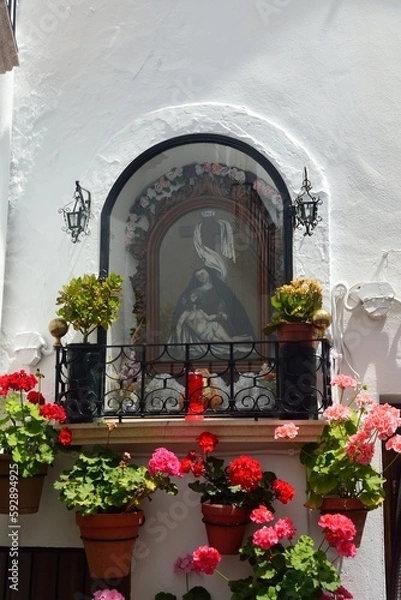 Fototapeta Capilla con flores en el Barrio de la Villa, Priego de Cordoba