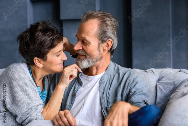 Fototapeta Senior couple close up. Communication between close people, touches, hugs.