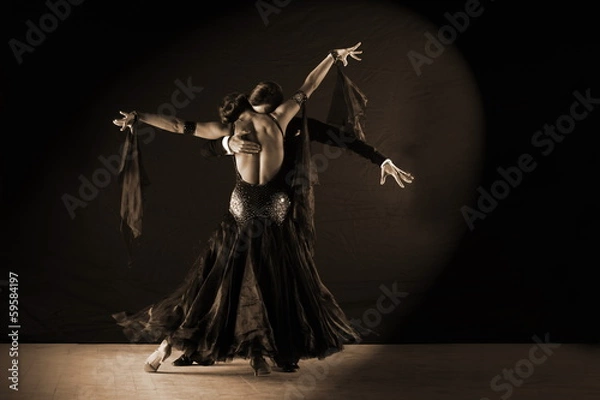 Fototapeta Latino dancers in ballroom against white background