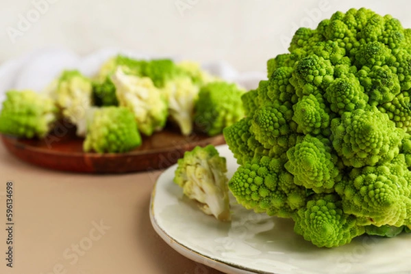 Fototapeta Plate with romanesco cabbage on beige table