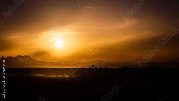 Fototapeta Quad im Sonnenuntergang 