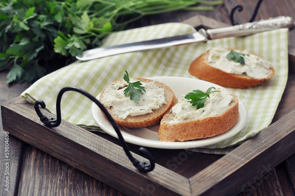 Fototapeta Slice of bread with cream cheese