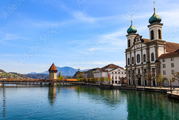 Fototapeta View of Jesuit church, Chapel bridge and the Reuss river in Lucerne, Switzerland