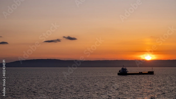 Fototapeta Sunset from the seaside on