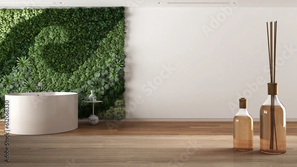 Fototapeta Wooden table top or shelf with aromatic sticks bottles over minimal bathroom with bathtub and vertical garden, modern architecture interior design