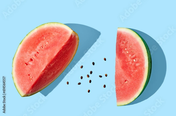 Fototapeta Cut watermelon on blue pastel background