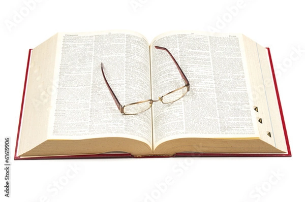 Fototapeta Open dictionary and eyeglasses