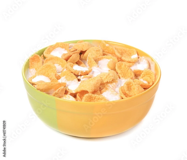 Fototapeta Bowl of sugar-coated corn flakes with milk.