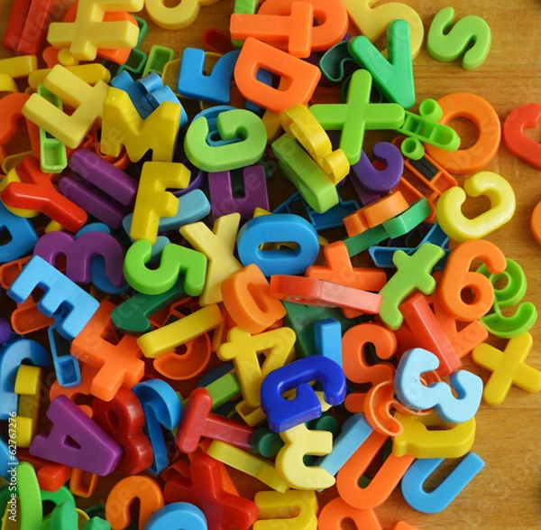 Fototapeta A pile of colorful letters and numbers