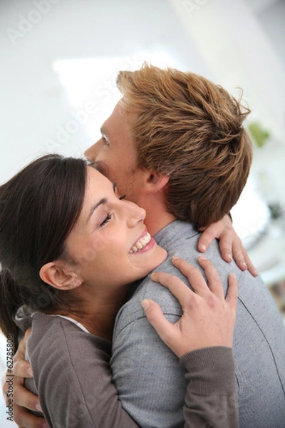 Fototapeta Couple embracing, happy to get back together