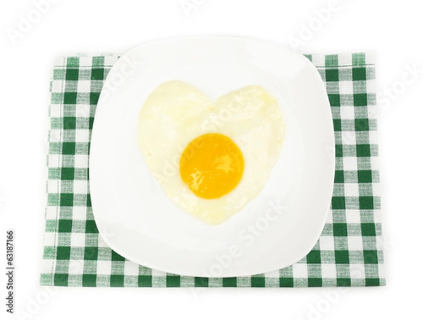 Fototapeta Scrambled eggs with bread on plate, on color napkin