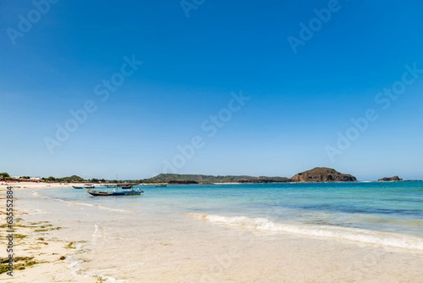 Fototapeta Lombok, Indonesia, Beach ocean panoramic view landscape at Tanjung Ann beach area. Lombok is an island in West Nusa Tenggara province, Indonesia.