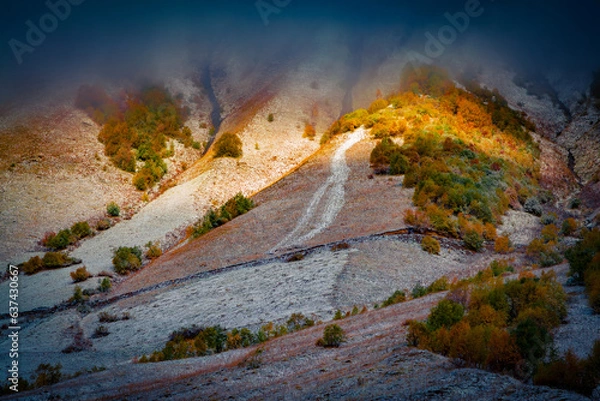 Fototapeta Dramatic autumn view of snowy slopes in Caucasus mountains. Unbelievable morning scene of Upper Svaneti, Ushguli village location, Georgia, Europe. Beauty of nature concept background.