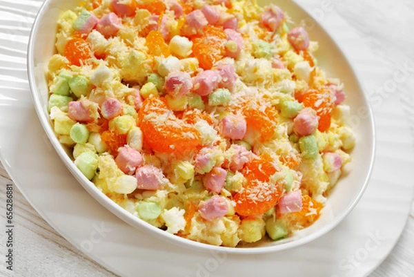 Fototapeta Ambrosia Salad in white bowl, top view