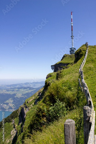 Fototapeta A tall tower on a hill