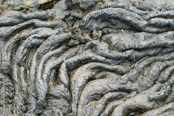 Fototapeta Textures of black lava (pahoehoe) in Santiago island