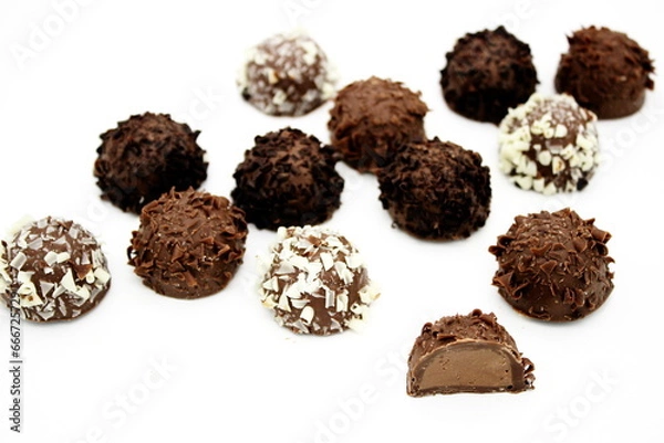 Fototapeta Several chocolates on white background