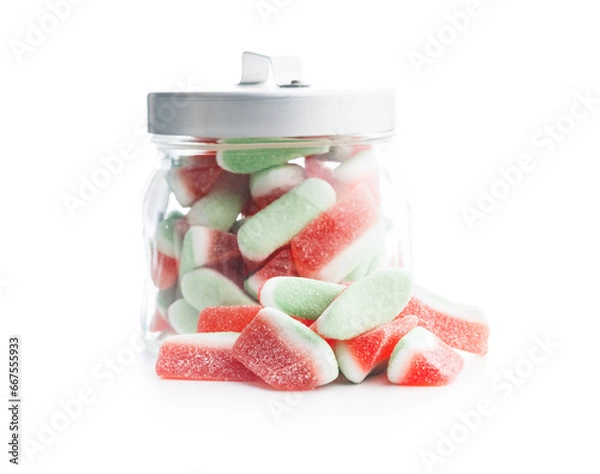 Fototapeta Watermelon jelly candies in jar isolated on white background.